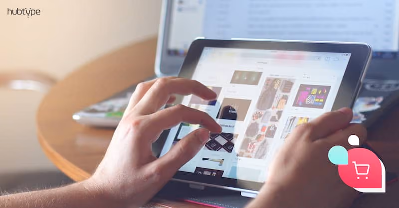 Person browsing online fashion store on tablet, exploring various clothing items, showcasing e-commerce shopping experience.