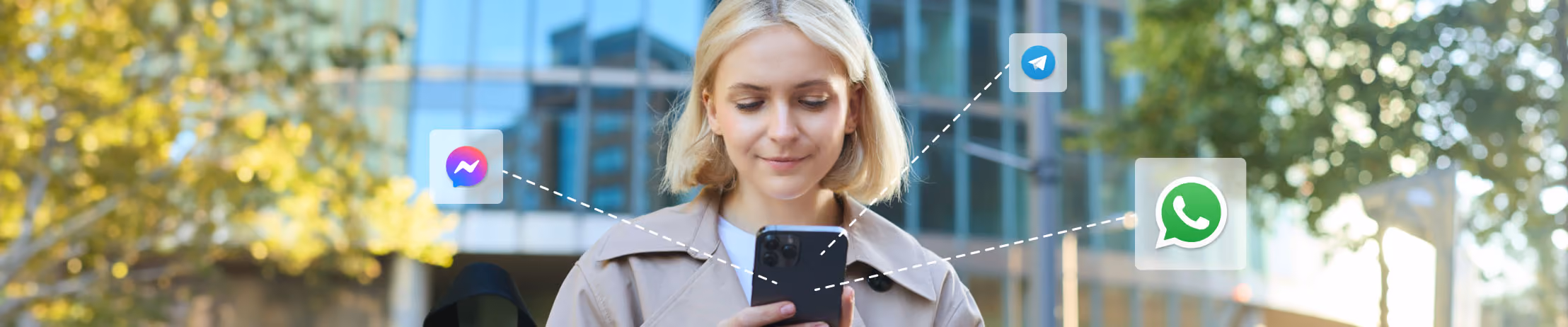 Woman using a smartphone outdoors with chat app icons like WhatsApp and Messenger, representing social media connectivity.