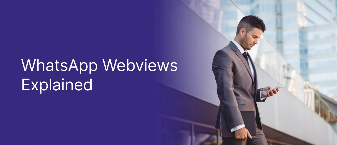 Professional businessman in dark suit checking smartphone near modern glass building with 'WhatsApp Webviews Explained' text