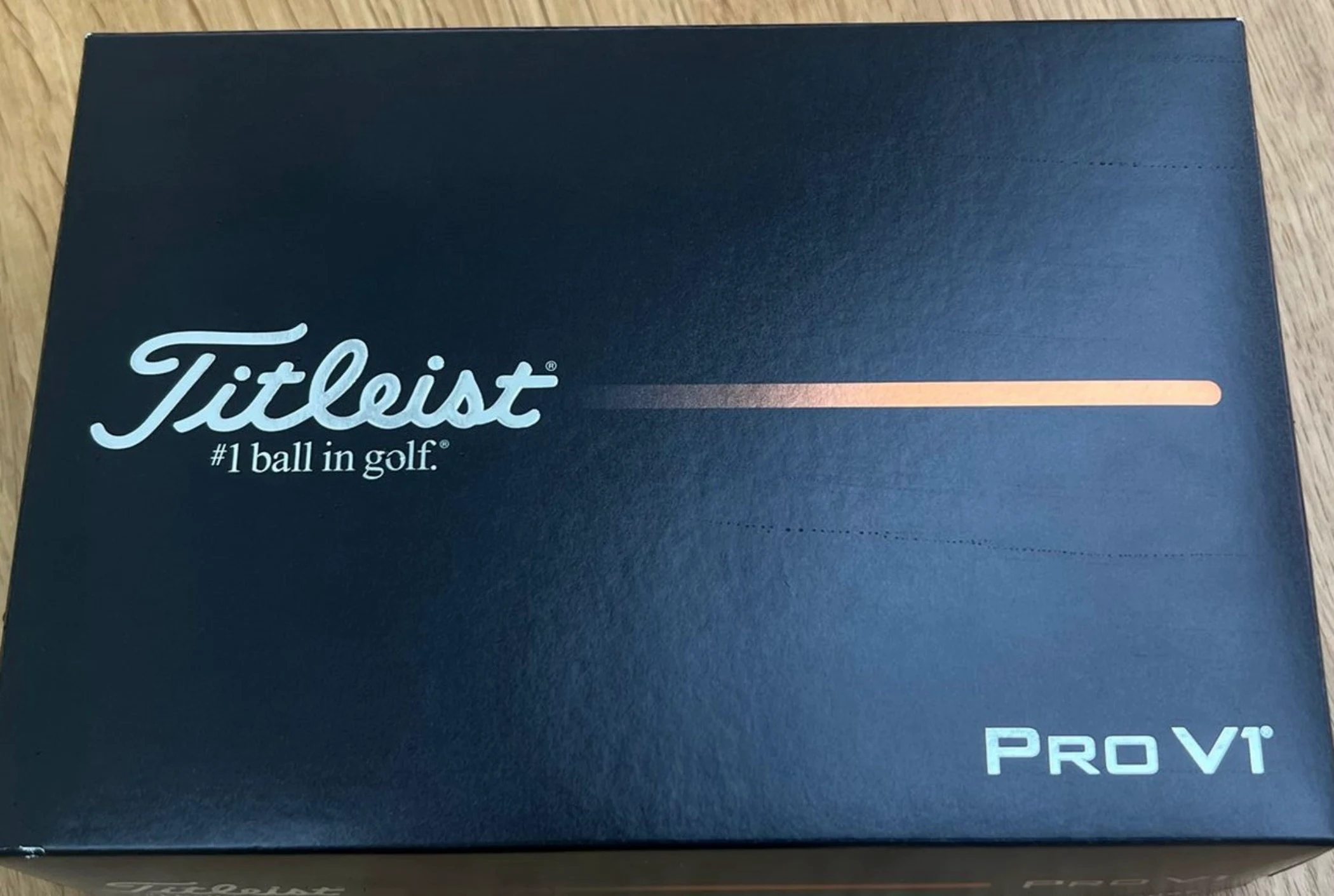 A box of 12 premium golf balls.