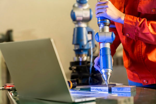 A 3D printer makes a component prototype for a welder