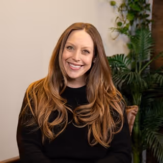 Professional headshot of Kirsten, Activate team member, showcasing professionalism
