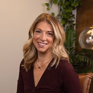 Professional headshot of Tara, Activate team member, with professional appearance