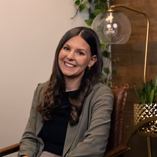 Professional headshot of Melissa, Activate team member, with friendly demeanor