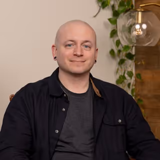 Professional headshot of Geoff, Activate team member, in corporate setting