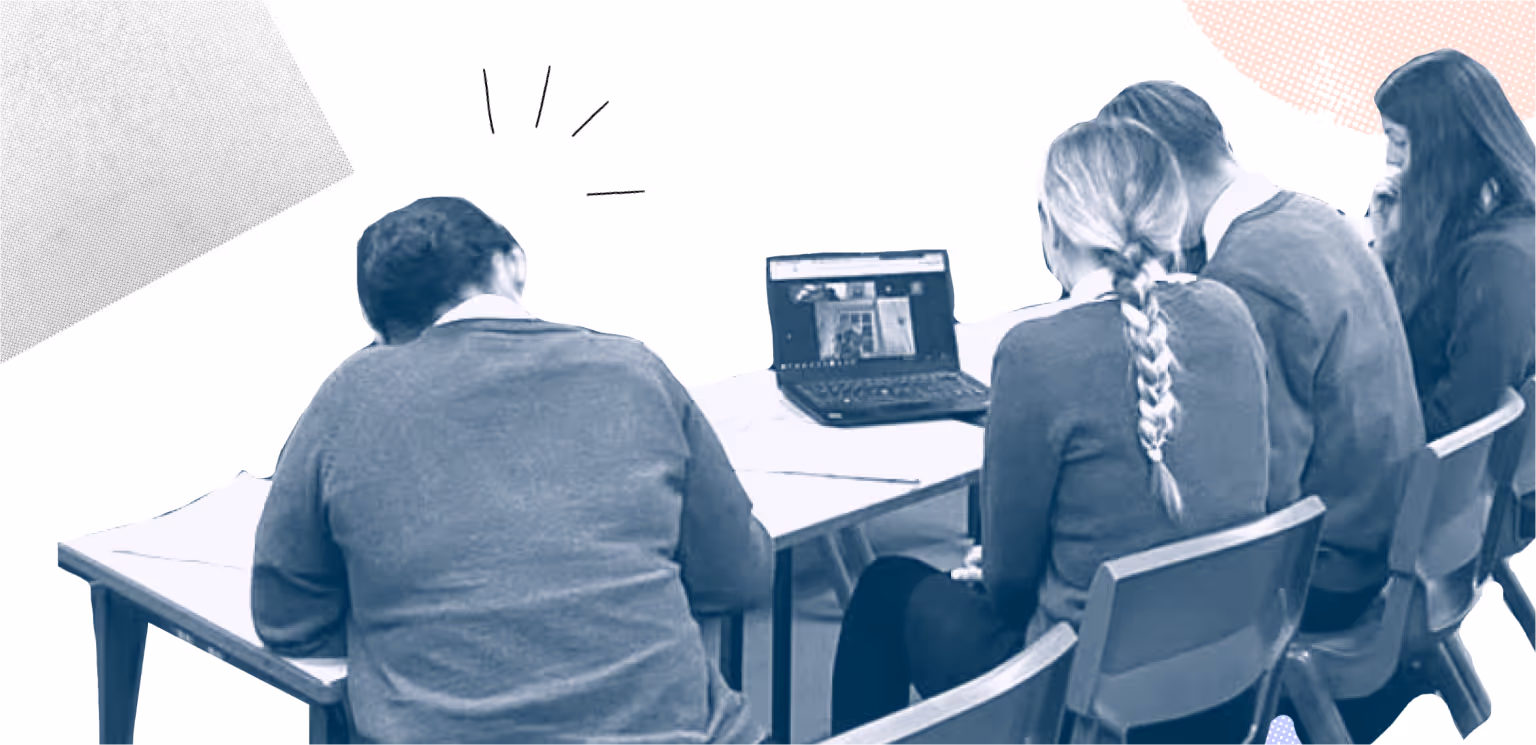 Learners in a classroom in conversation with MS Mark Drakeford ,seen on a laptop.
