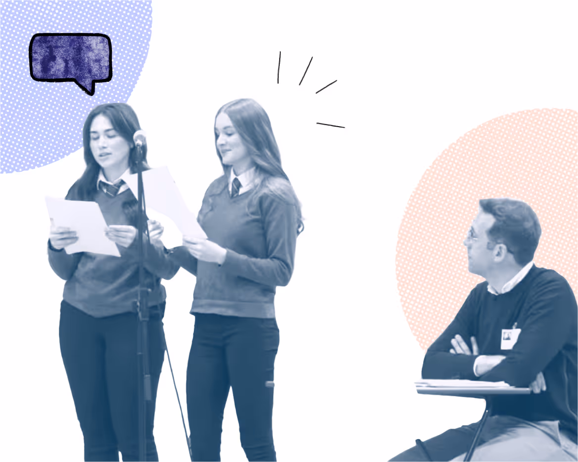 Two learners, reading from a script, chairing the Cardiff West Youth Hustings.
