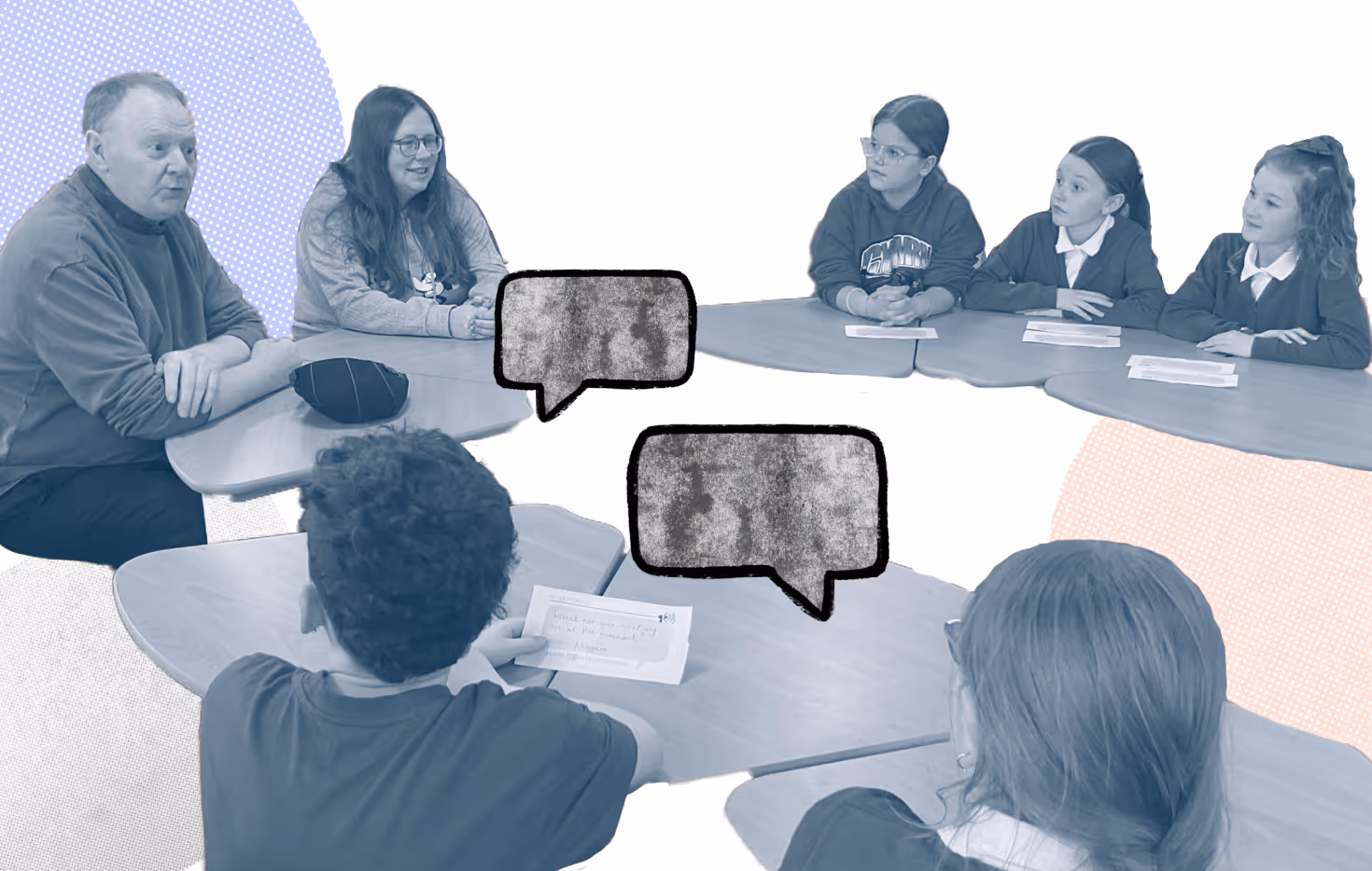Learners at Penygarn Primary around a table in conversation with Cllr Jon Horlor during in person dialogue session.