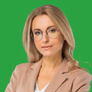 Woman in beige blazer, professional headshot