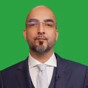 Bearded man in suit, professional headshot