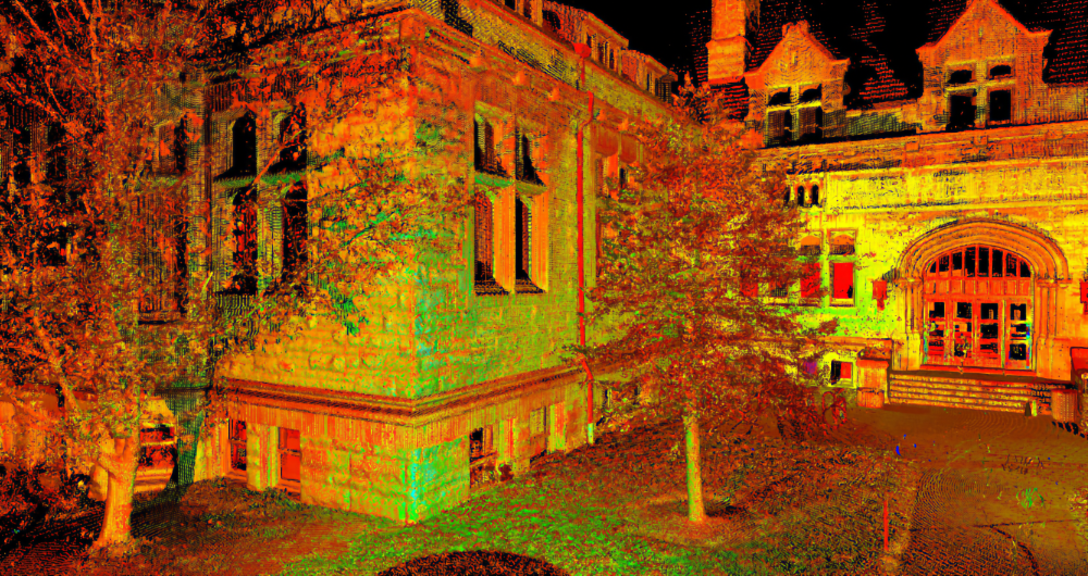 3D point cloud rendering of an old stone building with large windows and arched entrance, surrounded by trees.
