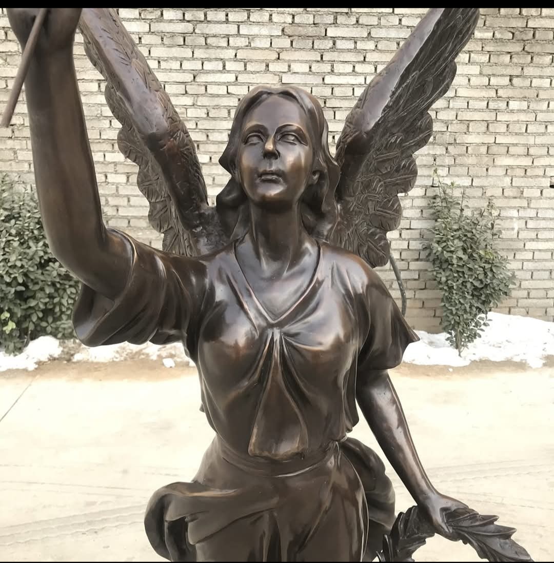 A statue of an angel in Bronze