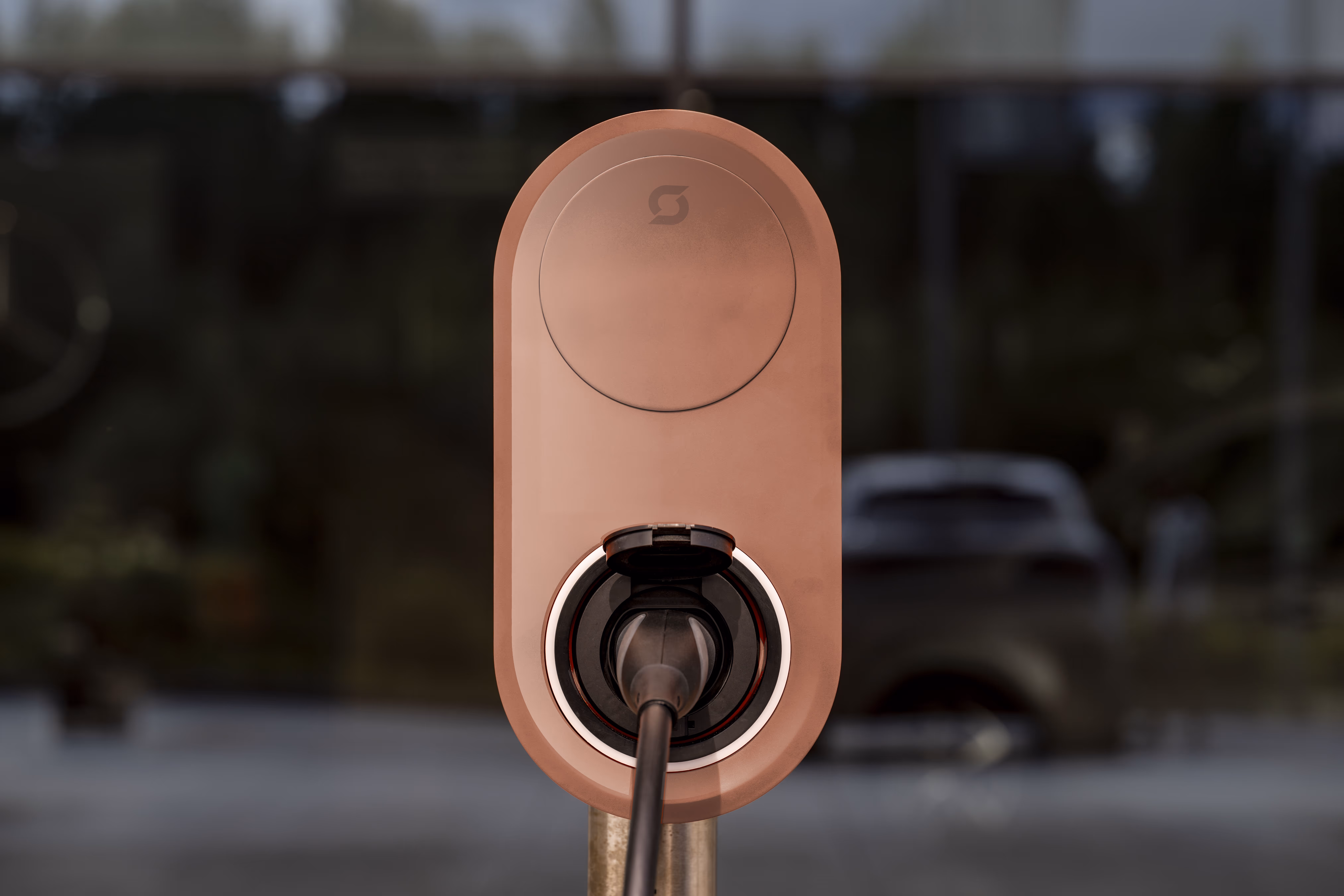 picture of a charging station in front of a car dealer during production days in Poland