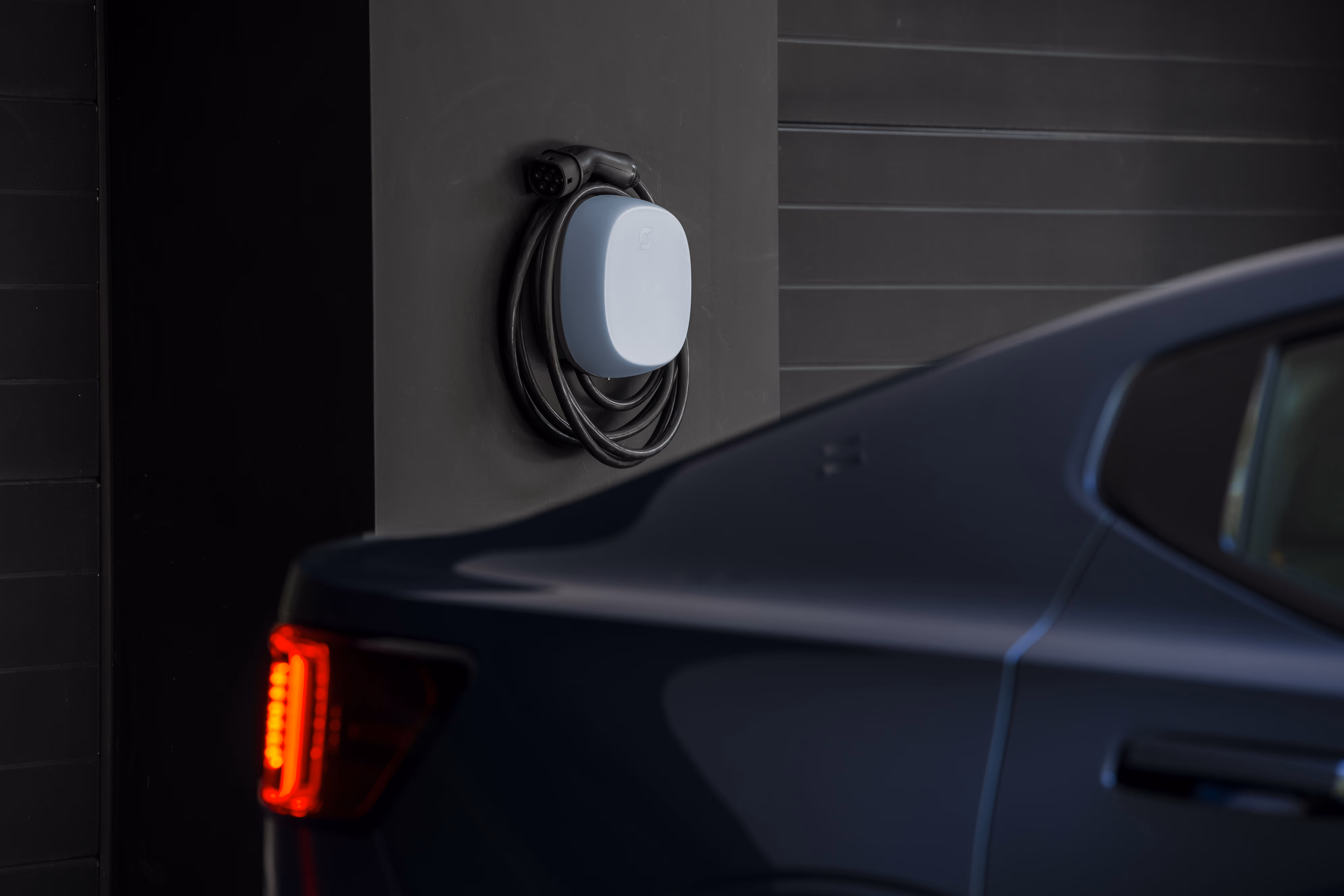 picture of an electric car getting charged