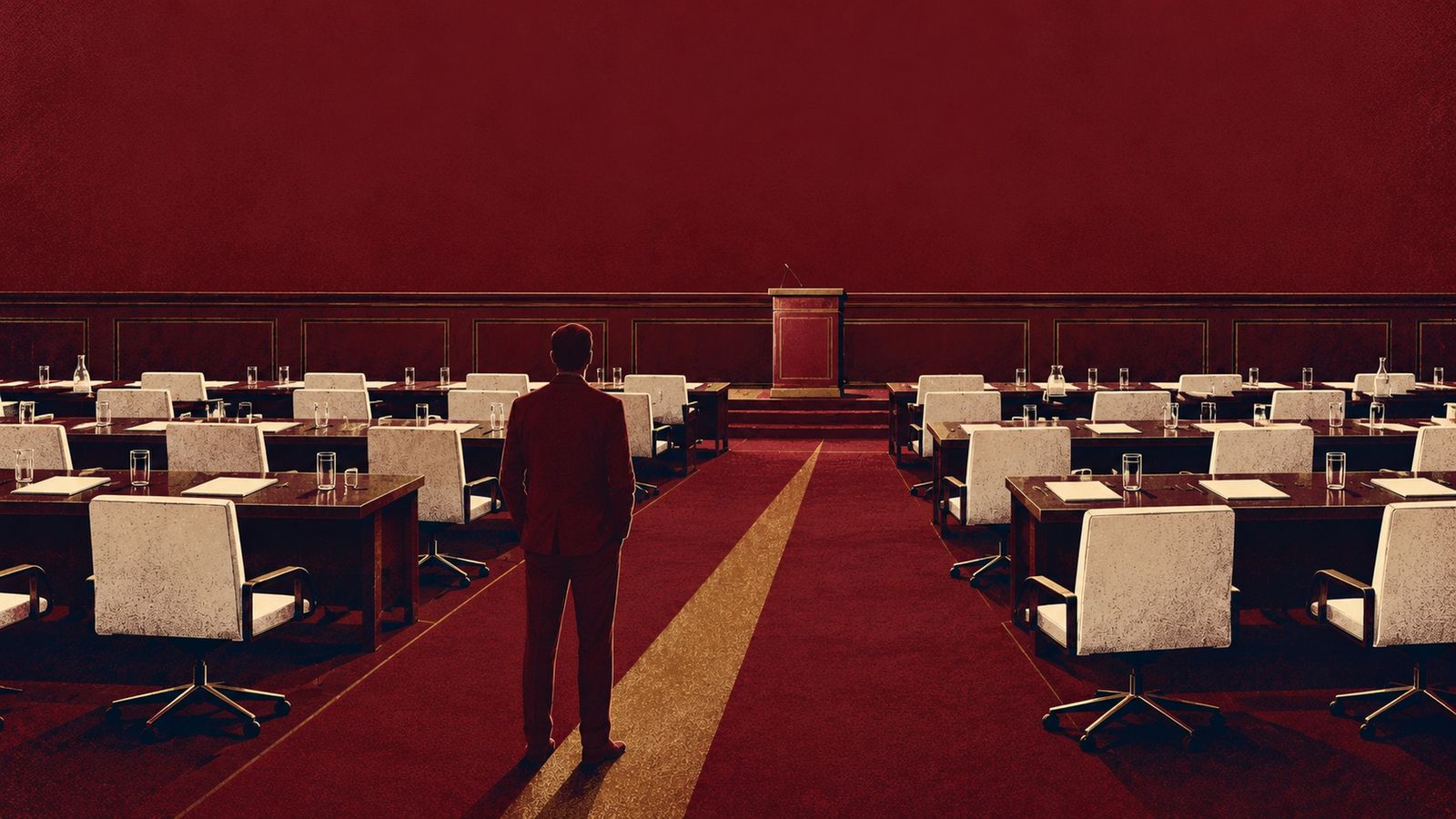 A lone oxblood figure stands in an empty summit room after everyone has left, on a gold aisle leading toward the lectern