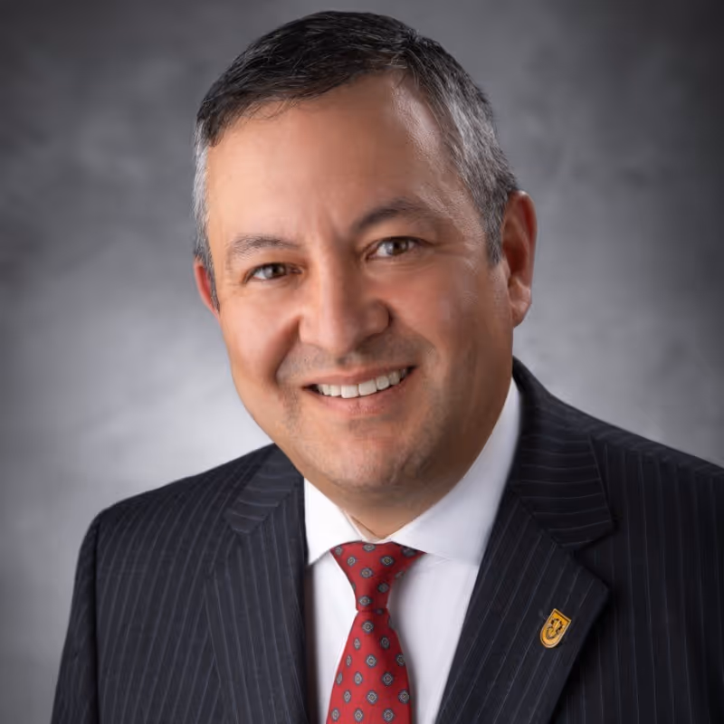 Michael S. Oshiki, President of Riverside Regional Medical Center & Acute Care Division at Riverside Health, featured in healthcare and leadership success story.