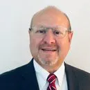 Eduardo J. Criado, President of Puerto Rico & the Caribbean at Aon Risk Solutions, featured in leadership and business growth testimonial.
