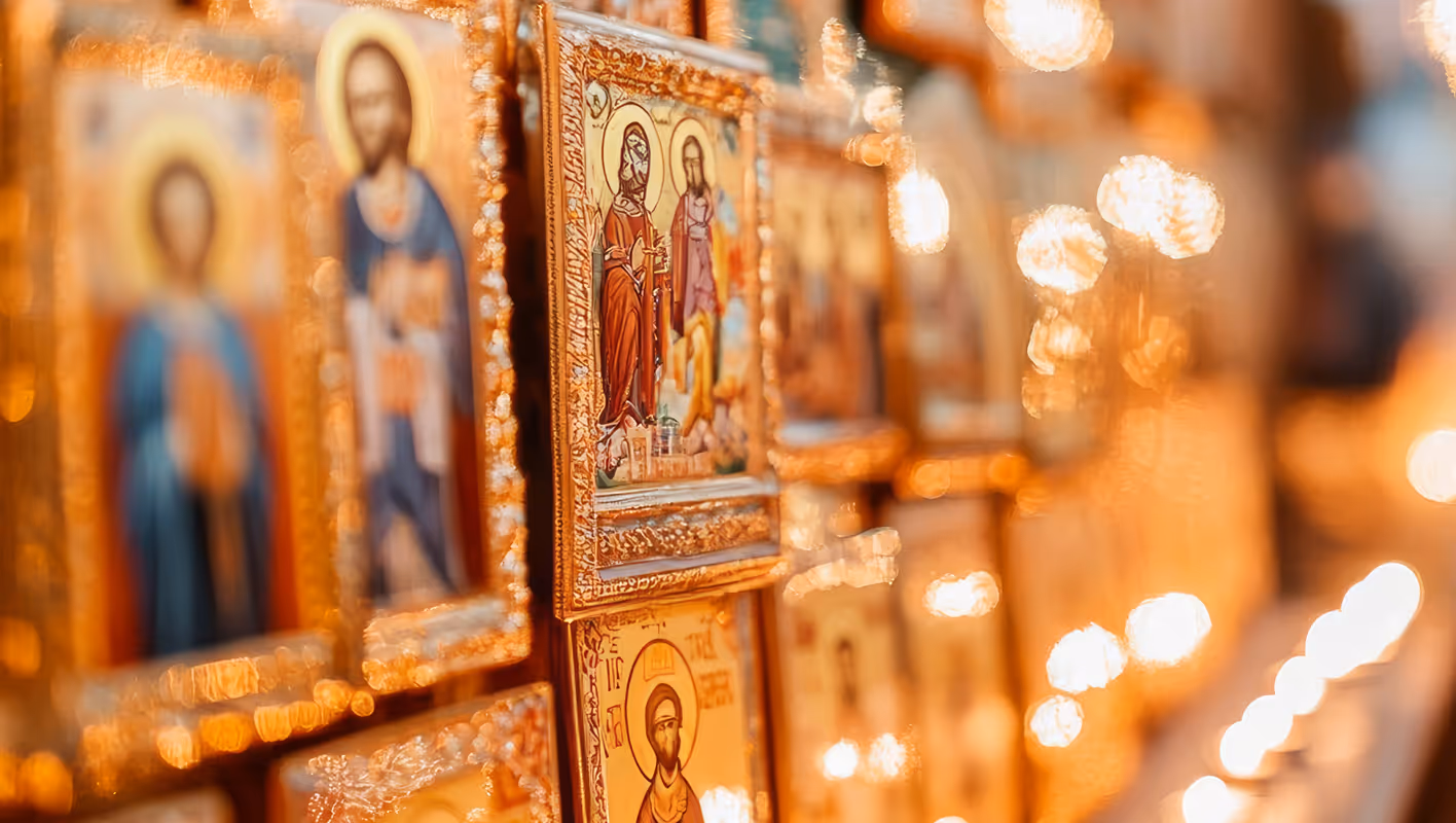 Religious icons featuring Jesus Christ and Christian saints in beautiful golden frames.