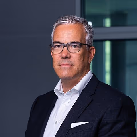 A devoted follower of Christ smiling as he focuses on spiritual growth.