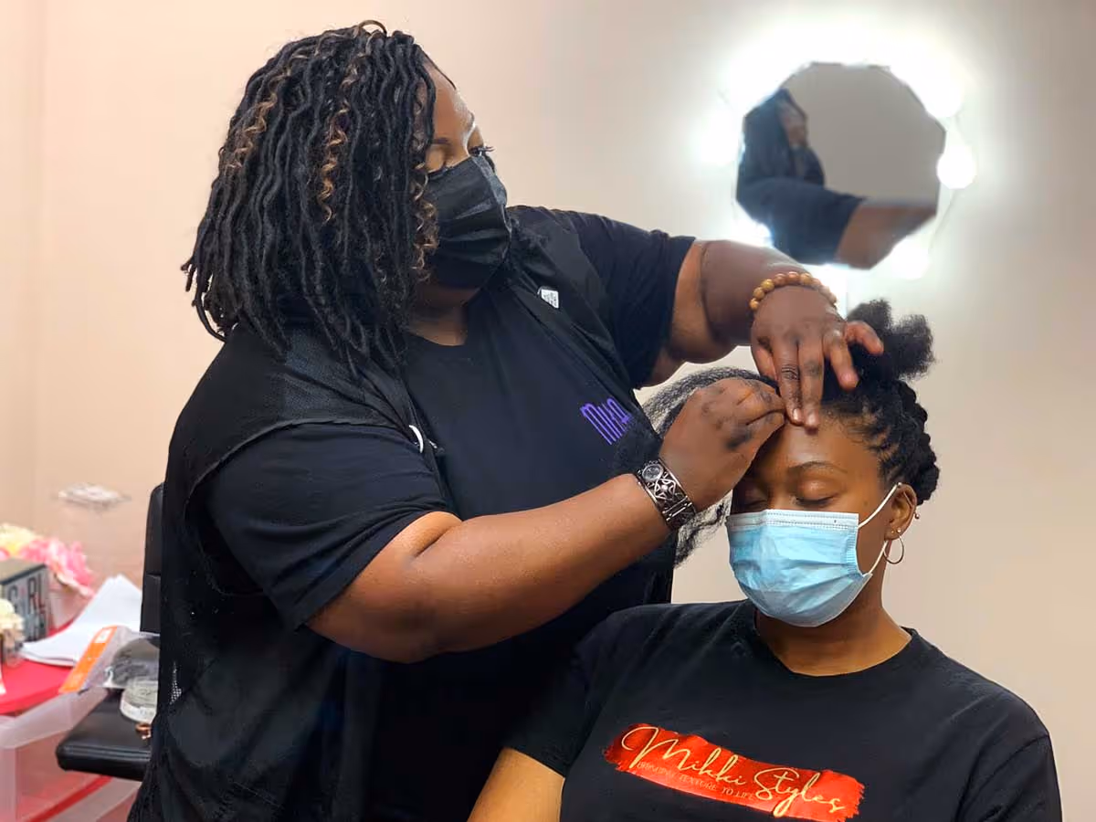 Woman getting a haircut