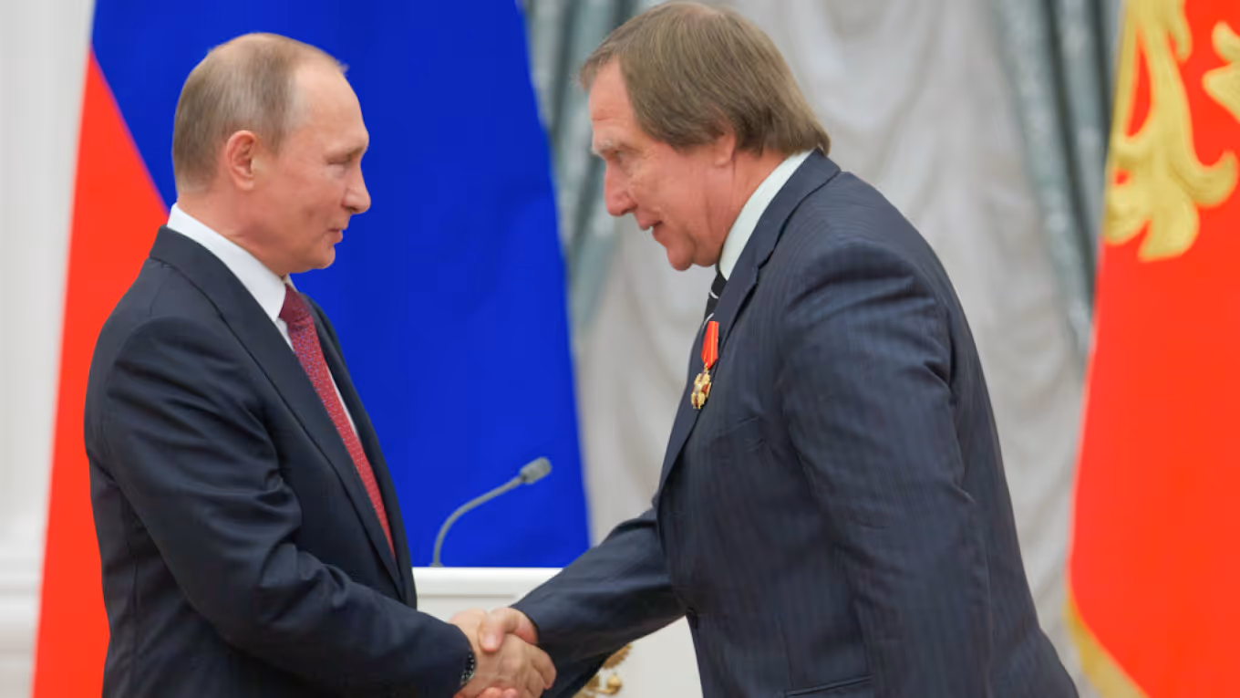 Putin and friend shaking hands