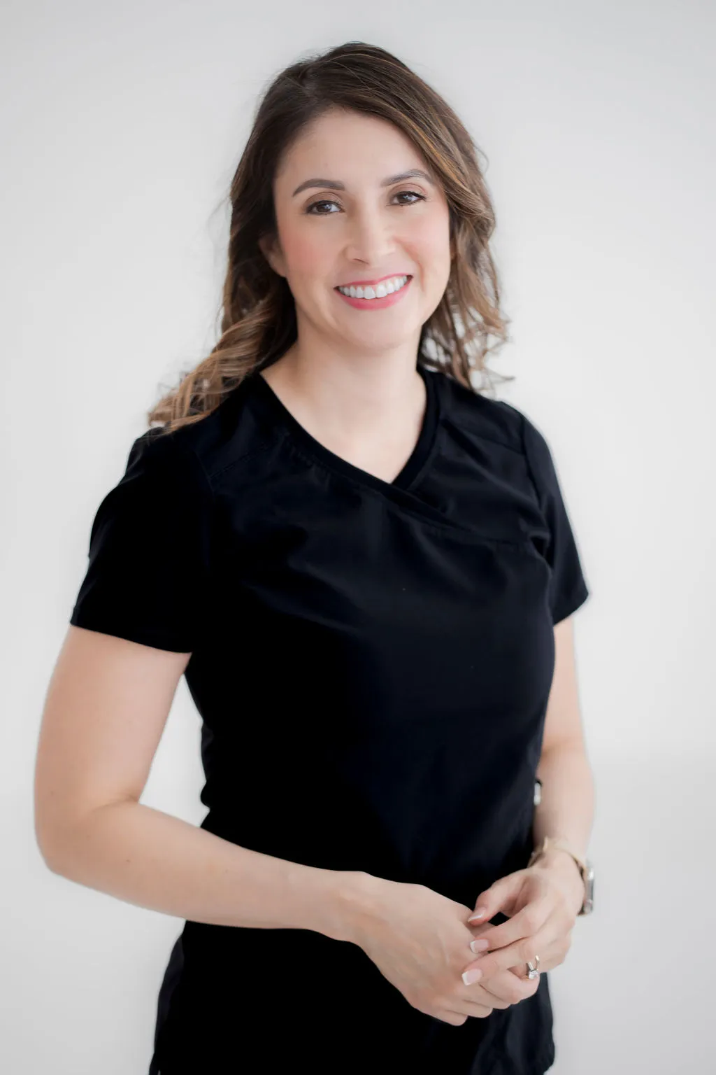 Headshot of Dr. Evelia Aragon, DC, a compassionate and professional specialist at Texas Dizziness Center, smiling warmly.