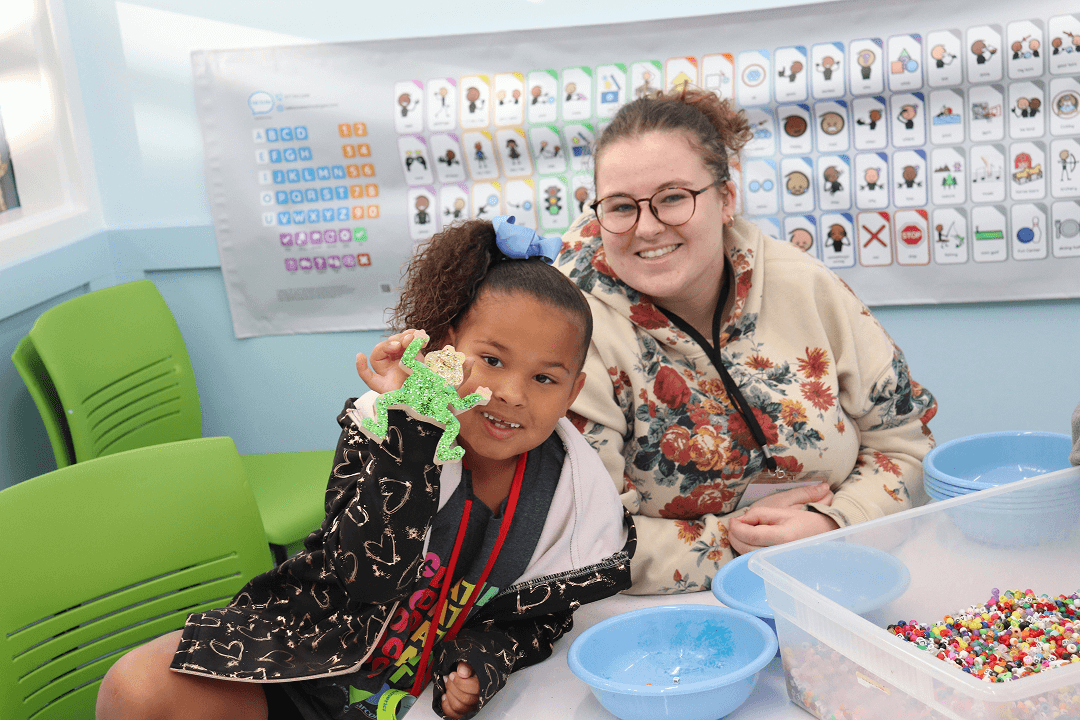 Volunteer with camper