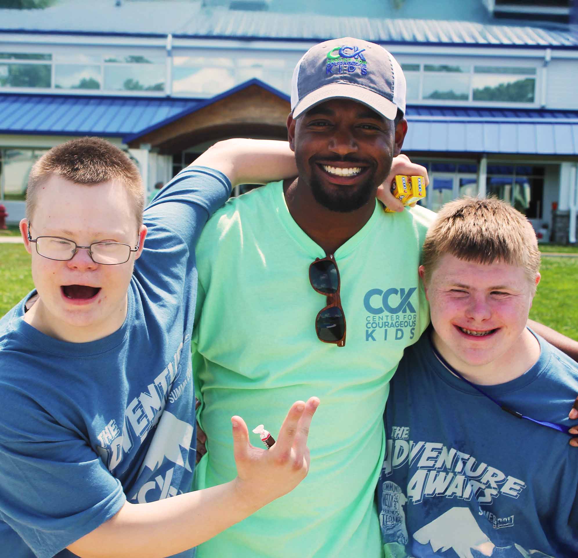 Volunteer with two campers