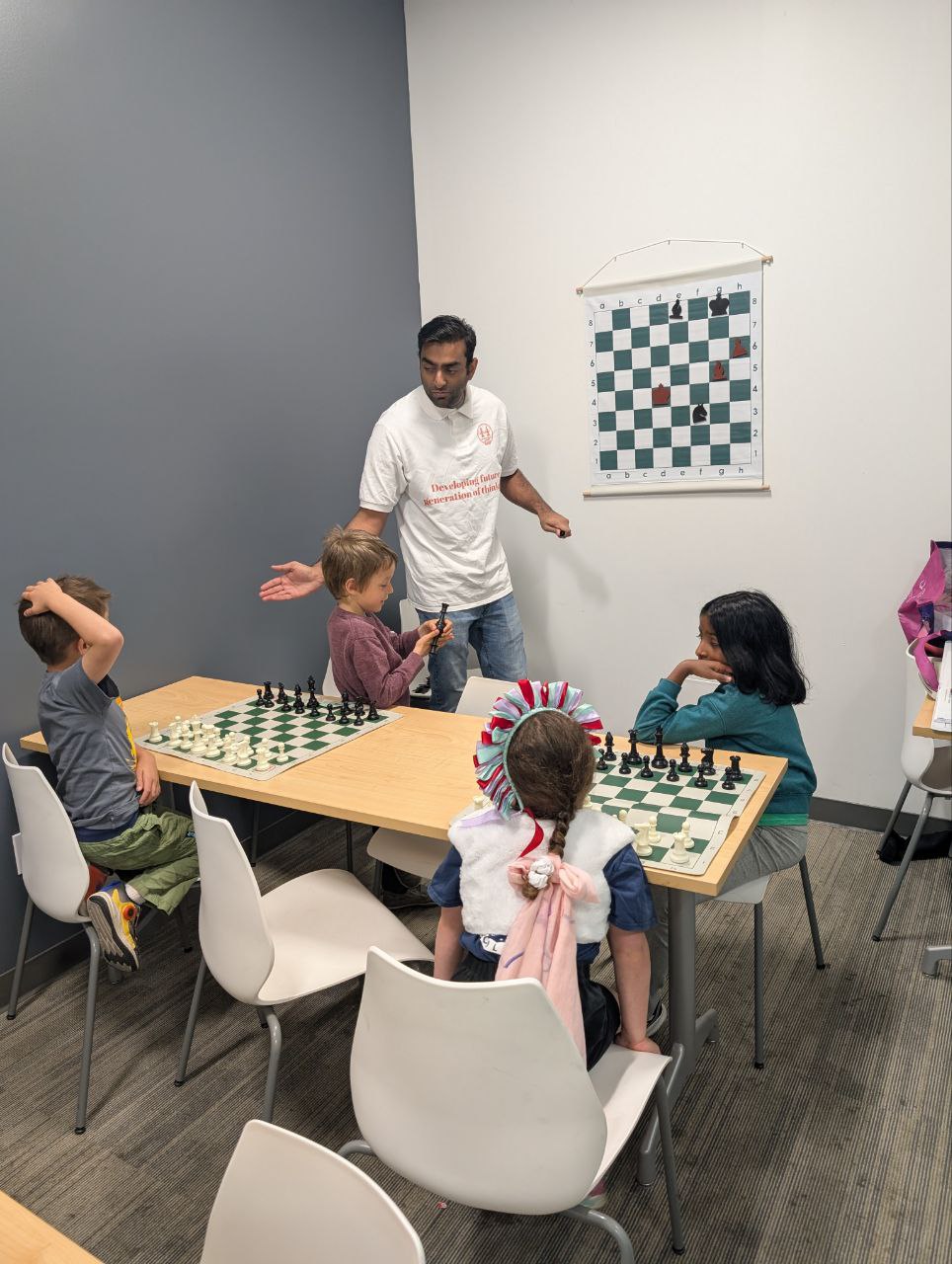 Portrait of Coach Archit, a young chess coach with a background in calculus and teaching
