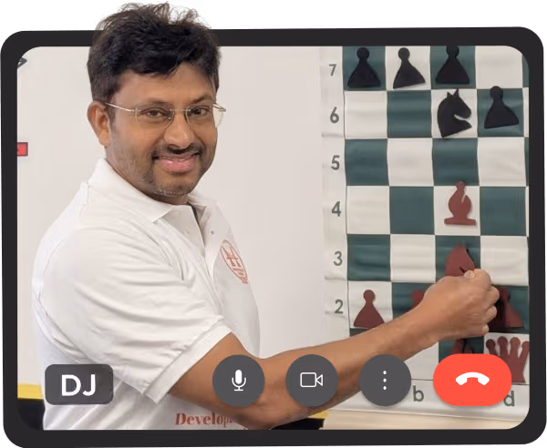 Coach DJ teaching students at an online video platform for online classes at Silicon Valley Chess Academy.
