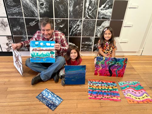 Family showing paintings