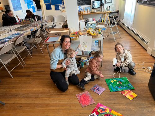 Child painting colorful picture