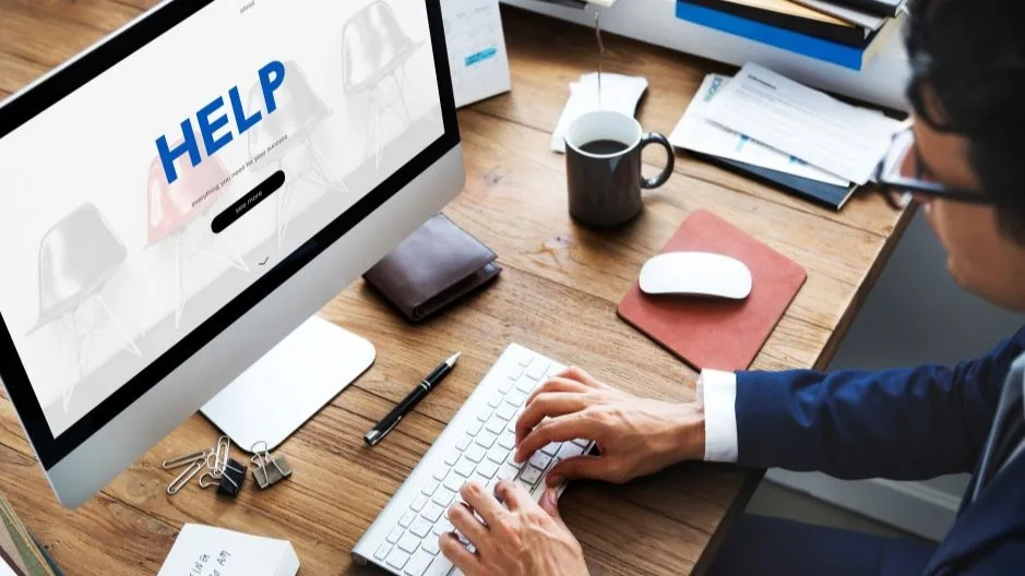 Person using an online helpdesk portal for customer support
