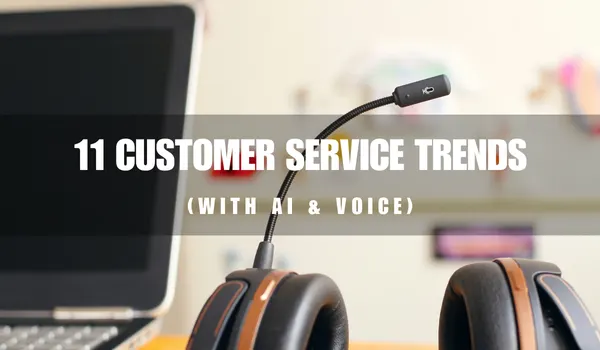 Headsets placed on the desk beside the laptop, symbolizing future AI and voice trends in customer service
