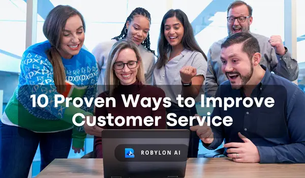 Happy team celebrating around a laptop, discovering 10 proven ways to improve customer support