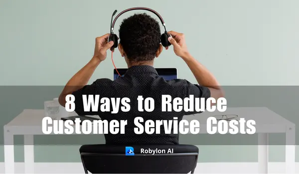 Man wearing headphones at desk - 8 proven ways to cut customer support costs without hurting CSAT