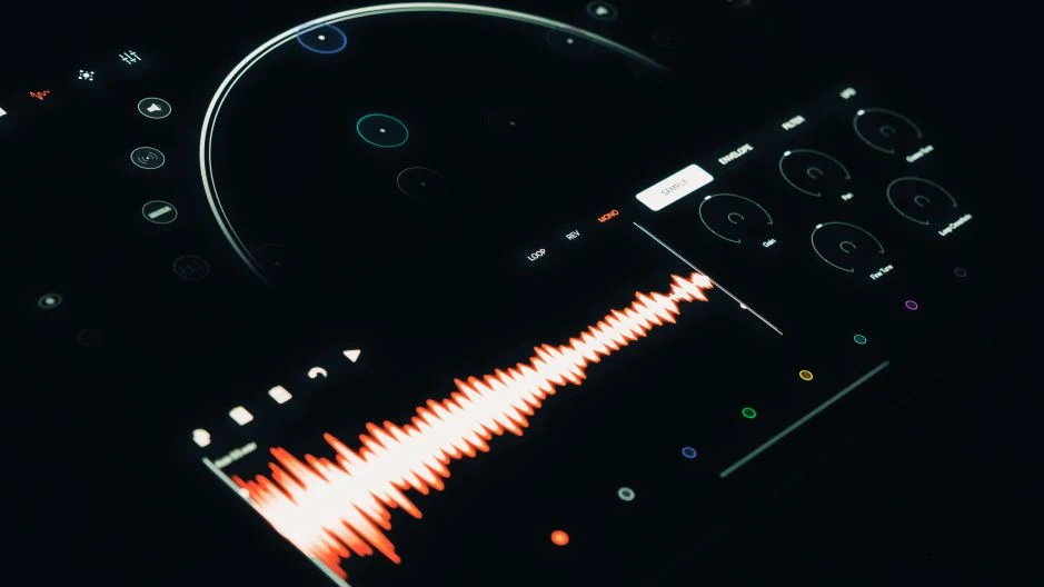 Orange audio waveform visualization on smartphone screen showing real-time voice AI speech processing and sound wave analysis