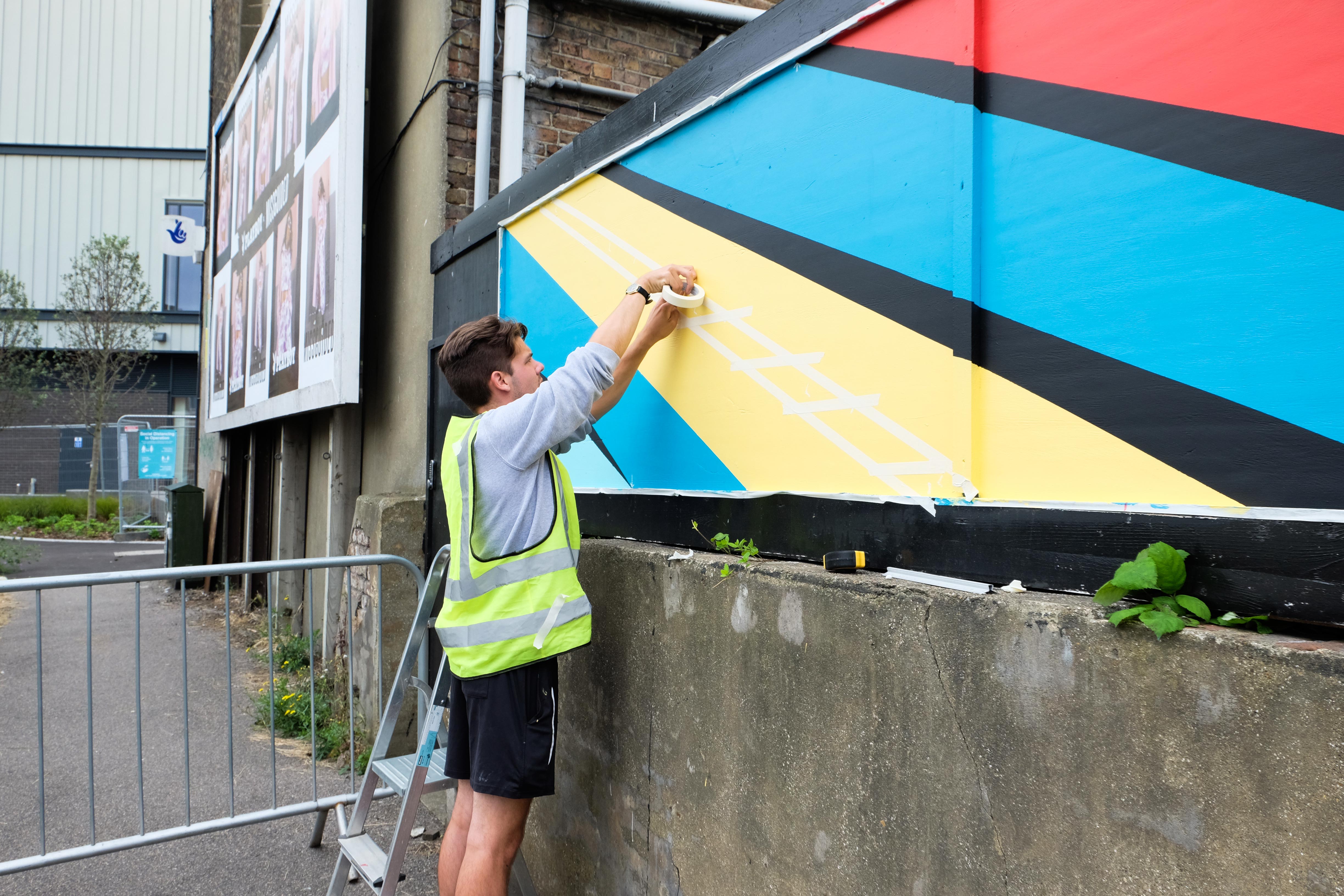 Close-up of mural design elements featuring local cultural motifs from Sittingbourne