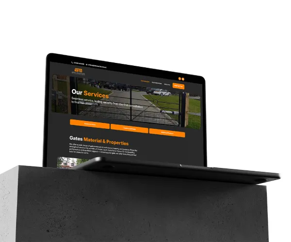 A laptop showing BM Gates Website
