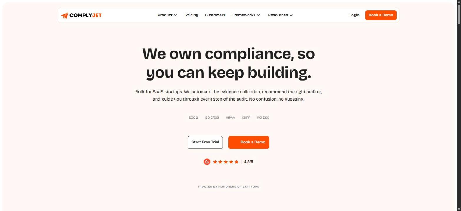 Screenshot of ComplyJet's homepage, showing its 'We own compliance, so you can keep building.' headline.