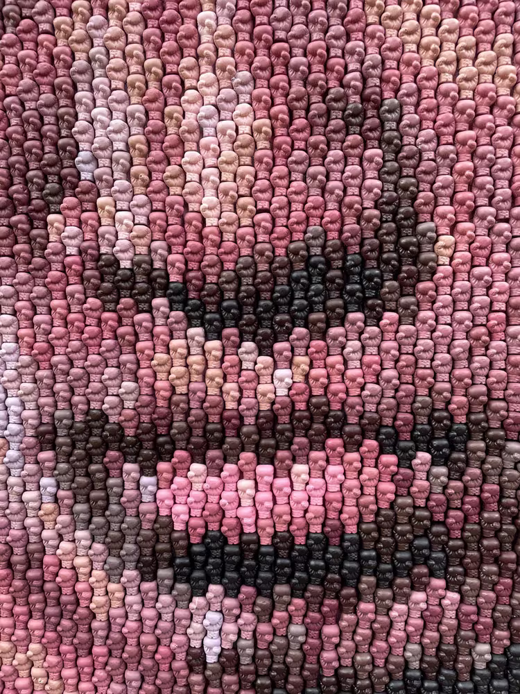 Detail of the Ali boxing-glove mosaic by Kevin Champeny showing individual hand-cast gloves