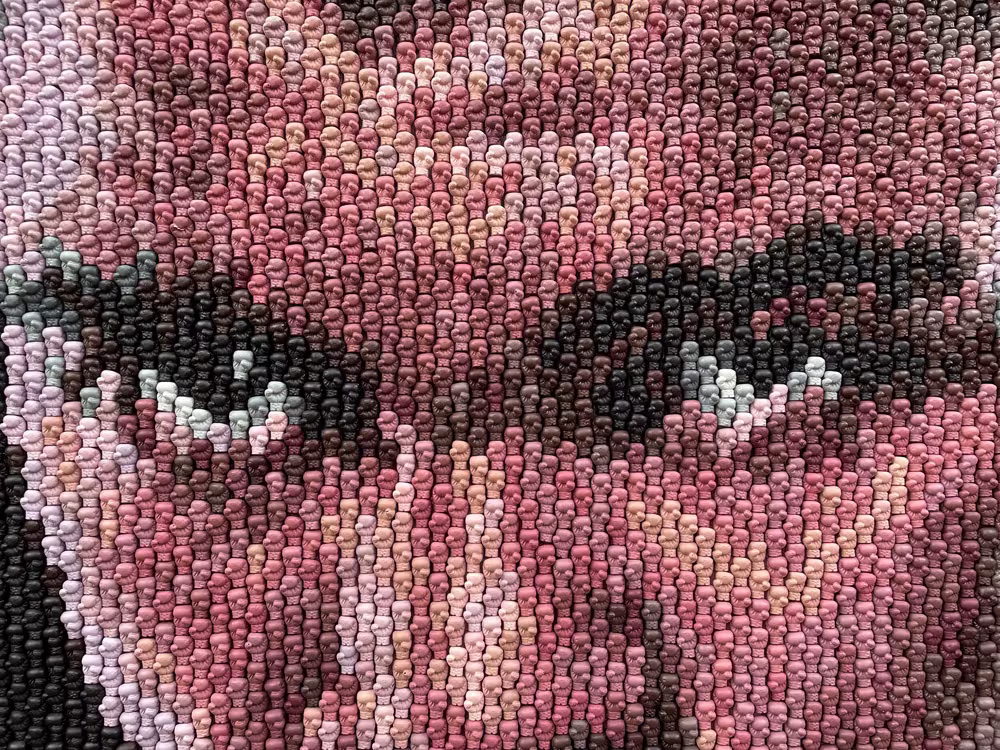 Detail of the Ali boxing-glove mosaic by Kevin Champeny showing individual hand-cast gloves
