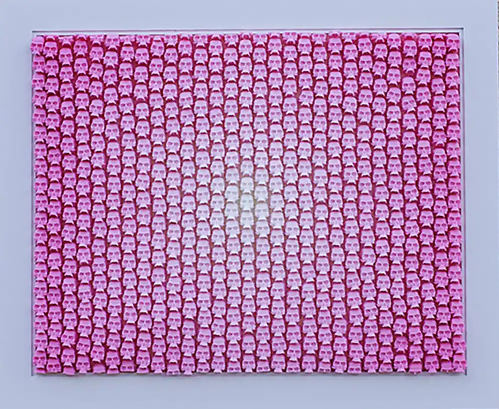 Itty Bitty Pretty in Pink mosaic by Kevin Champeny, 550 hand-cast skulls in 25 shades of pink