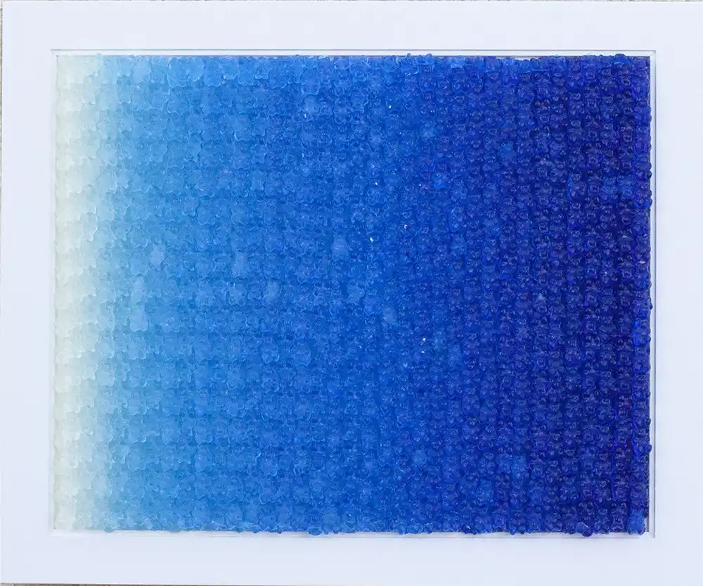 Sweet Fade mosaic by Kevin Champeny, 1,200 hand-cast gummy bears in 36 shades of blue