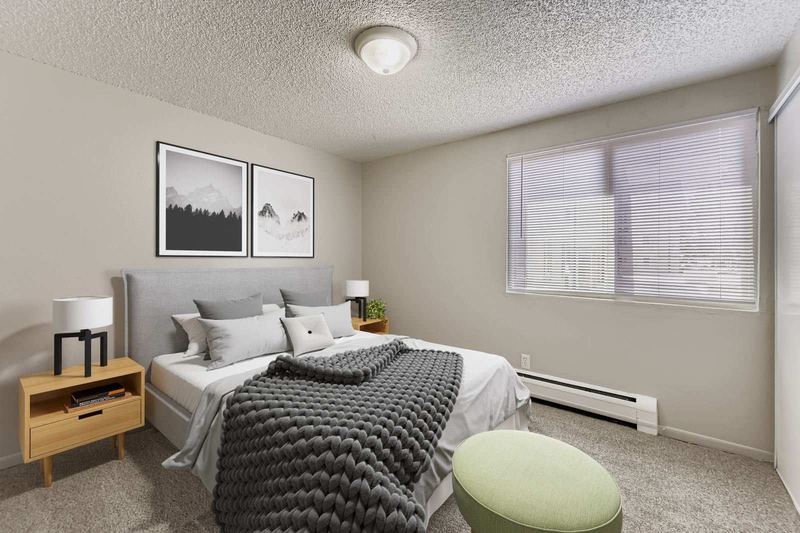 Living room area with brick white wall accent seating area with coffee table and tv
