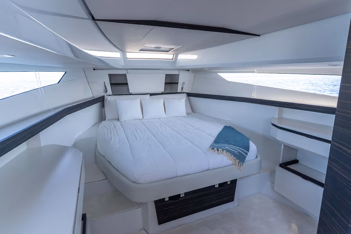 Bedroom area of the Fiart Seawalker 39 featuring a round bed and modern interior finishes.