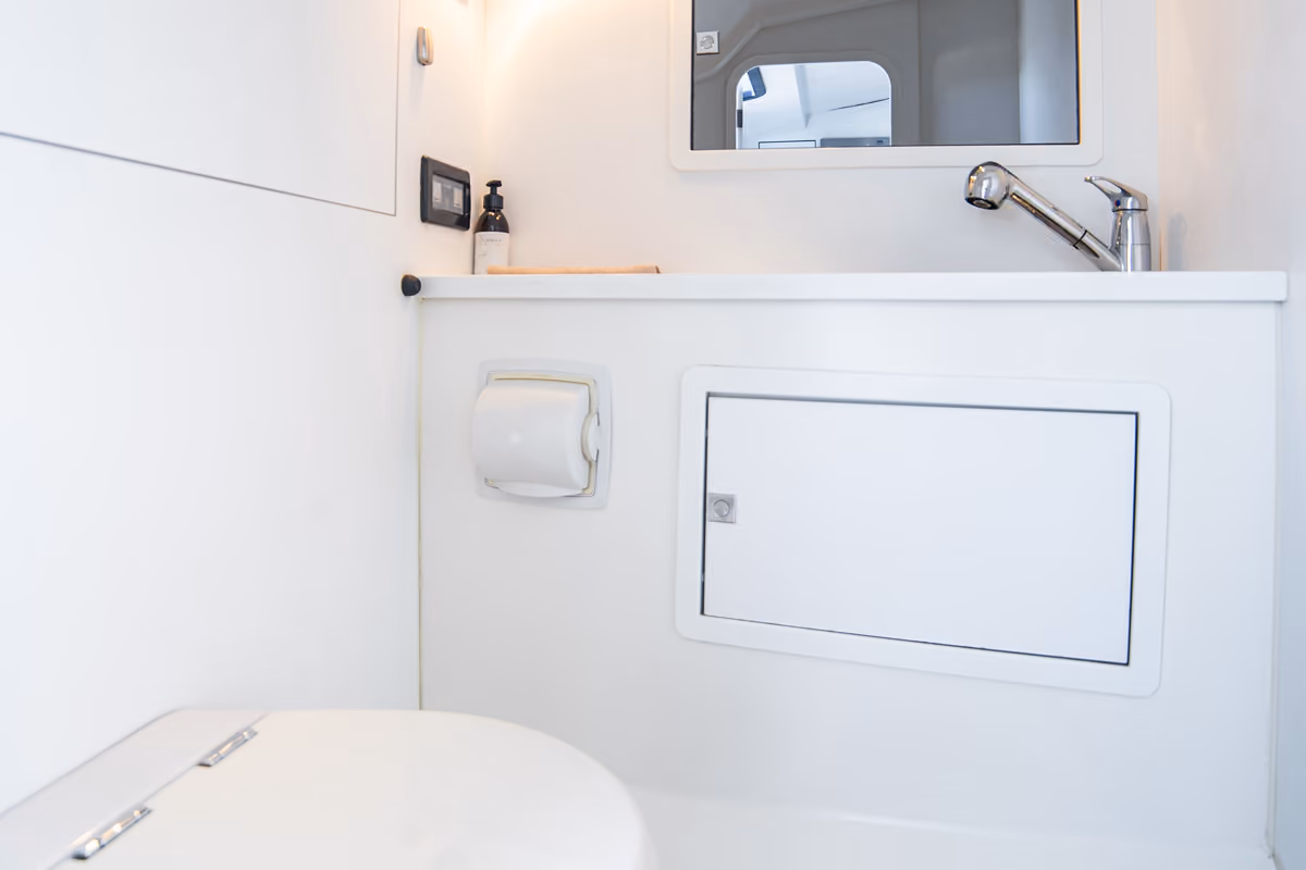 Interior lounge area of the VanDutch 40 charter, showcasing comfort and elegance.
