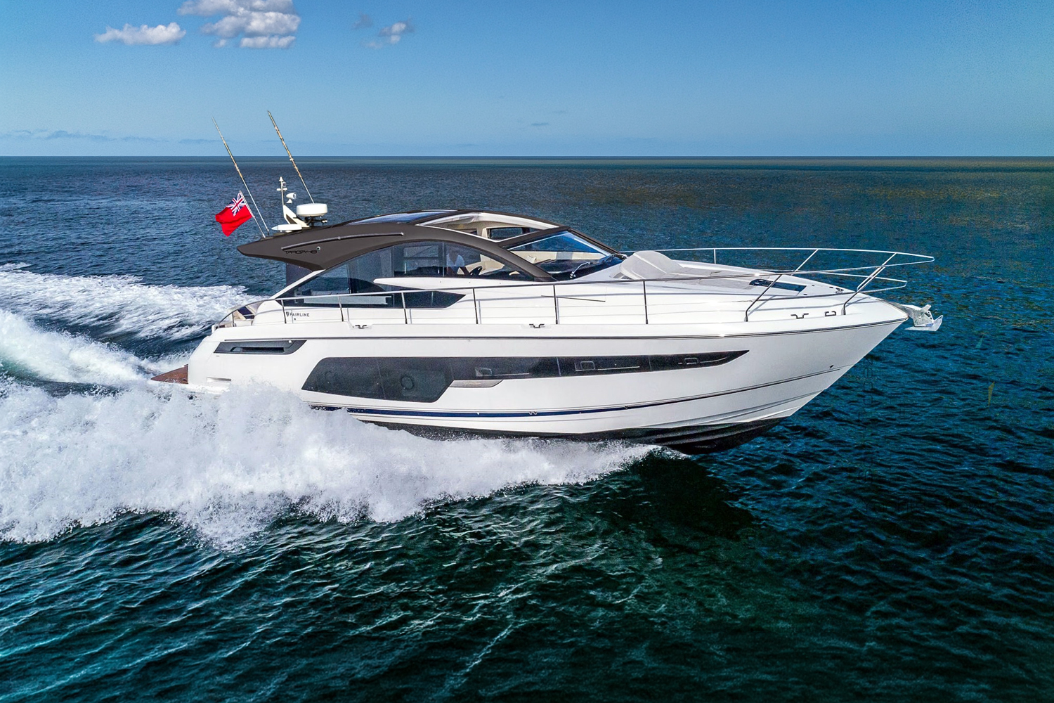 The Targa 50 Open charter speeds across the water, showcasing its sleek design and powerful presence.