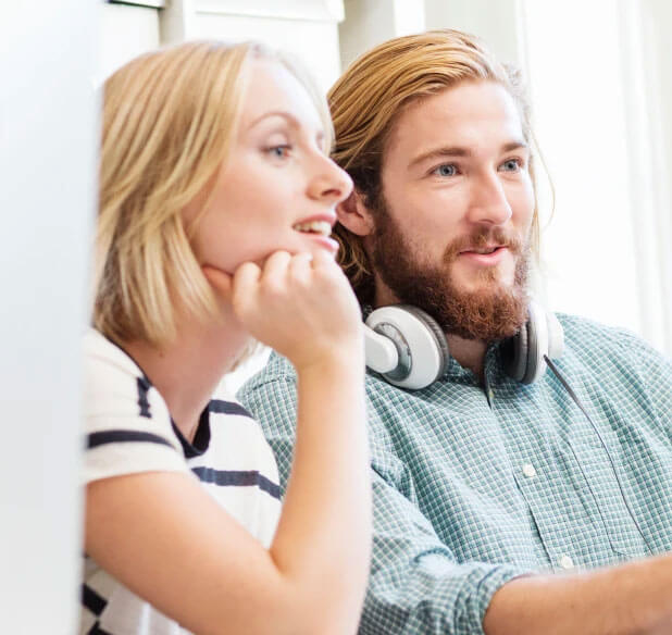 couple looking at a screen