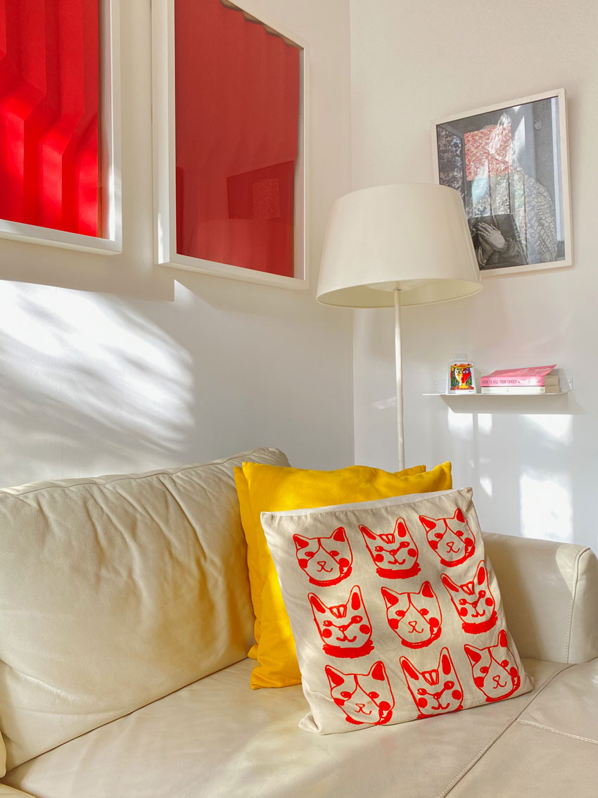 Cushions on white leather sofa in the sitting room. Malta property for sale. 
